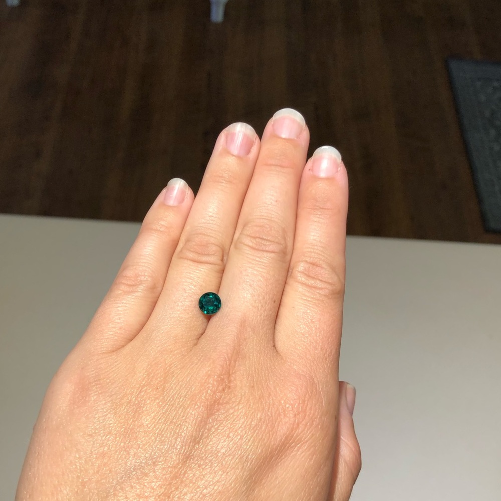 Loose lab grown emerald from ring